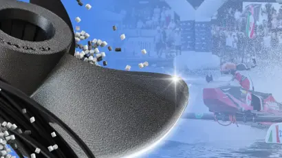 Primo piano di materiali compositi con elica e gara di motonautica sullo sfondo.