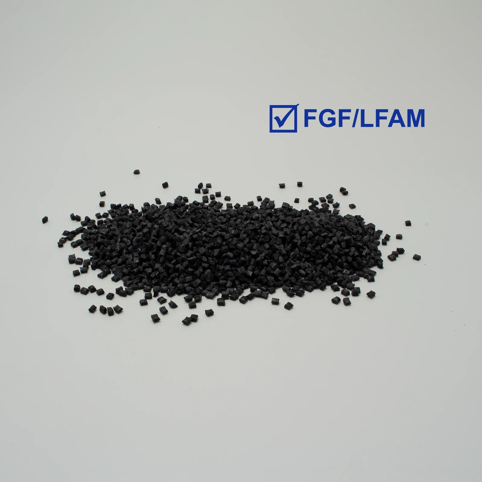 Black pellets on a white background with a blue FGF/LFAM logo on the right.